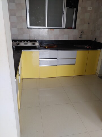 Kitchen in 3 BHK Apartment at Axis Paradigm Whistling Meadows, Paud Road – for Rent