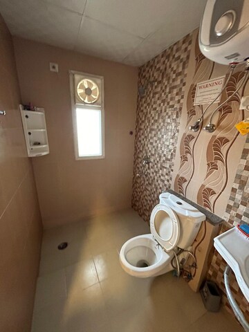 Bathroom in 4 BHK Apartment at Purvanchal Royal City, Chi V Greater Noida – for Rent
