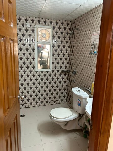 Bathroom in 4 BHK Apartment at Purvanchal Royal City, Chi V Greater Noida – for Rent