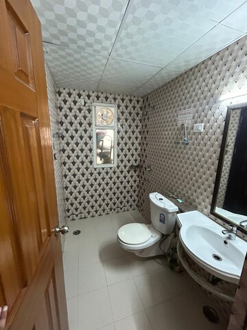 Bathroom in 4 BHK Apartment at Purvanchal Royal City, Chi V Greater Noida – for Rent