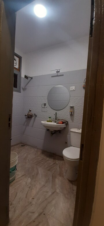 Bathroom in 3 BHK Builder Floor at Land Craft Golf Links Villa, Pandav Nagar – for Sale