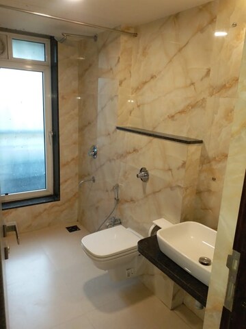Bathroom in 4 BHK Apartment at Satellite Glory, Andheri East – for Sale