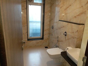 Bathroom in 4 BHK Apartment at Satellite Glory, Andheri East – for Sale