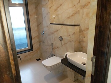 Bathroom in 4 BHK Apartment at Satellite Glory, Andheri East – for Sale