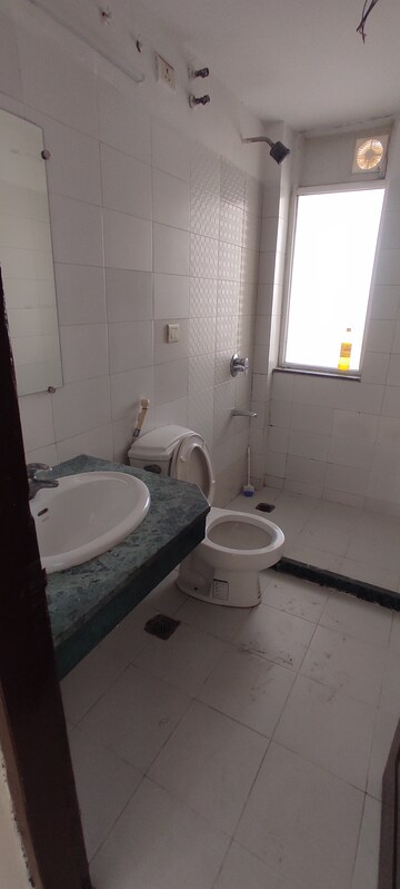 Bathroom in 3 BHK Apartment at Puri Pranayam, Sector 82 – for Rent