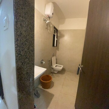 Bathroom in 1 BHK Apartment at Puranik Rumah Bali, Ghodbunder Road – for Rent