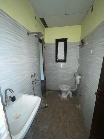 Bathroom in 3 BHK Apartment at Landcraft Golf Links, Pandav Nagar – for Rent