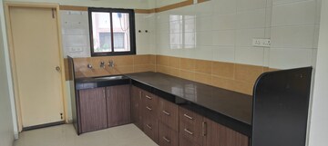 Kitchen in 3 BHK Apartment at Om Aishwarya Residency, Wakad – for Rent