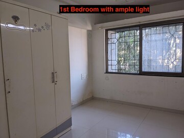 Room in 2 BHK Apartment at Fossil Fiesta, Dhankawadi – for Sale
