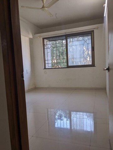 Room in 2 BHK Apartment at Fossil Fiesta, Dhankawadi – for Sale
