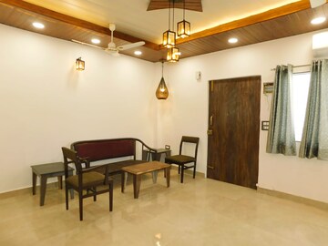 Living Room in Studio Builder Floor at Panchshil Avant Garde, New Friends Colony – for Rent