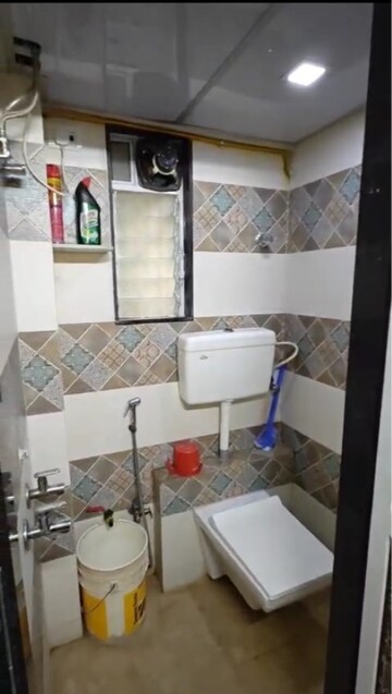 Bathroom in 2 BHK Apartment at Shantinagar CHS, Mira Road – for Sale