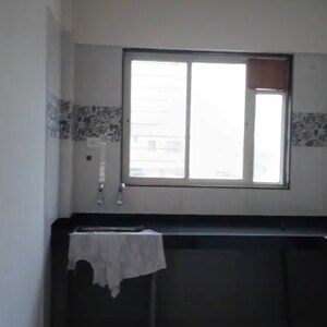 Kitchen in 2 BHK Apartment at Old Sangvi – for Sale