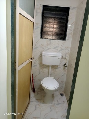 Bathroom in 1 BHK Apartment at Yashraj Park CHS, Kasarvadavali – for Rent