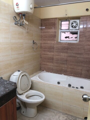 Bathroom in 3 BHK Apartment at Rohtas Summit, Vibhuti Khand – for Rent
