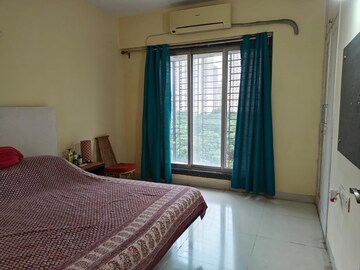Bedroom in 2 BHK Apartment at Nakshatra Swastik Alps, Brahmand – for Rent