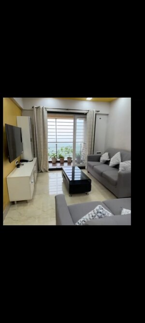 Living Room in 2 BHK Apartment at Siddhi Highland Park, Kolshet Road – for Sale