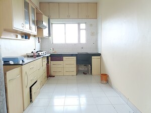 Kitchen in 3 BHK Apartment at Kumar Aangan, Yerawada – for Rent