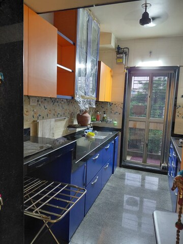 Kitchen in 2.5 BHK Apartment at Kalpataru Siddhachal Elegant, Vasant Vihar – for Rent