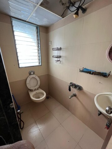 Bathroom in 1 BHK Apartment at Om Ashish C.H.S, Malad West – for Rent