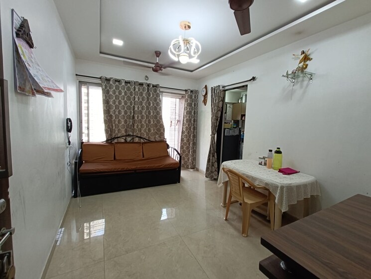 Living Room, rna-ng-ocean-pearl 1 Bedroom 650 Sq.Ft. Apartment In Mira Road Thane 8953567