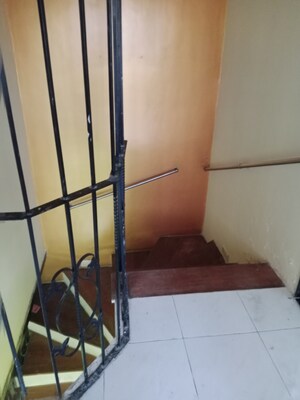 Staircase in 3 BHK Penthouse at Green Acres Apartment, Waghbil – for Sale