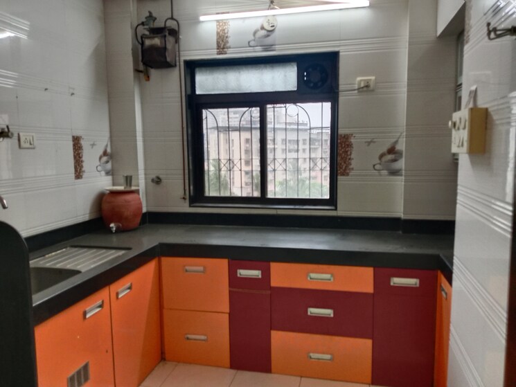 Kitchen, green-acres-apartment 3 Bedroom 980 Sq.Ft. Penthouse In Waghbil Thane 8953732