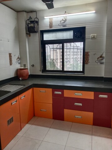 Kitchen in 3 BHK Penthouse at Green Acres Apartment, Waghbil – for Sale