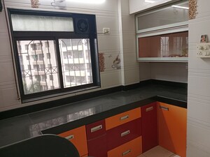 Kitchen in 3 BHK Penthouse at Green Acres Apartment, Waghbil – for Sale