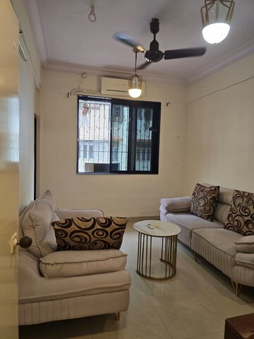 Living Room in 1 BHK Apartment at Bandra West – for Rent