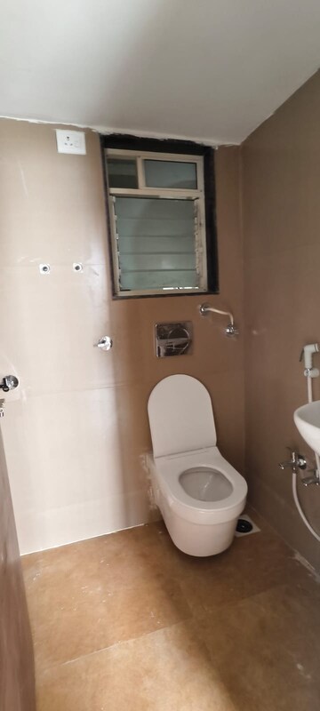 Bathroom in 1 BHK Apartment at Amar Raj Vaibhav NX, Dombivli West – for Rent