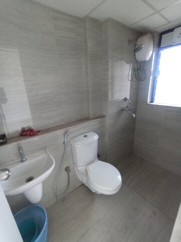 Bathroom in 1 BHK Apartment at Runwal Gardens Phase I, Dombivli East – for Rent