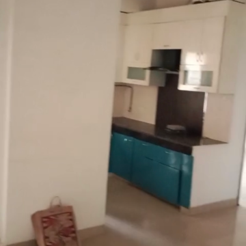 Kitchen in 2 BHK Apartment at Paramount Floraville, Sector 137 – for Sale