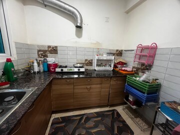 Kitchen in 4 BHK Apartment at Gaur Yamuna City Gaur Suites, Gaur Yamuna City – for Rent