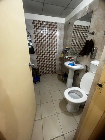 Bathroom in 4 BHK Apartment at Gaur Yamuna City Gaur Suites, Gaur Yamuna City – for Rent