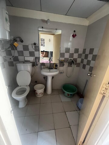 Bathroom in 4 BHK Apartment at Gaur Yamuna City Gaur Suites, Gaur Yamuna City – for Rent
