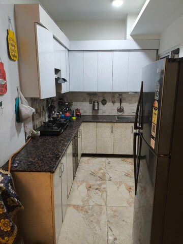 Kitchen in 2 BHK Apartment at Gaur Atulyam, Omicron I Greater Noida – for Rent