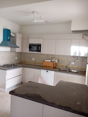 Kitchen in 4 BHK Apartment at Godrej Woods, Sector 43 – for Rent