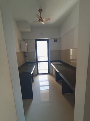 Kitchen in 1 BHK Apartment at Lodha Palava City Lakeshore Greens, Dombivli East – for Sale