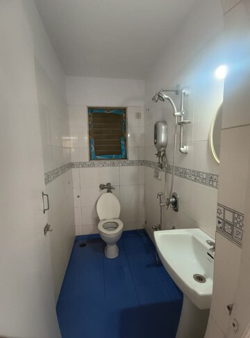 Bathroom in 2 BHK Apartment at Kalpa Taru Siddhachal III, Vasant Vihar – for Rent