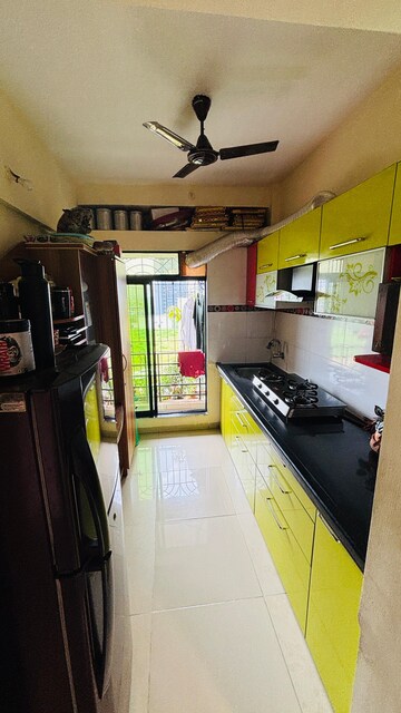 Kitchen in 2 BHK Apartment at Yuvraj Bonzer Carnival, Kharghar – for Sale