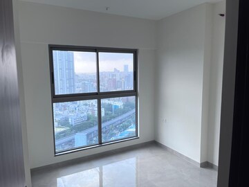 Room in 1 BHK Apartment at Ajmera Boulevard, Malad West – for Rent