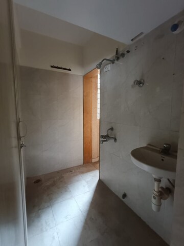 Bathroom in 1 BHK Apartment at Puranik Hometown, Ghodbunder Road – for Rent