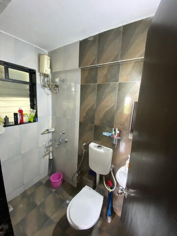 Bathroom in 1 BHK Apartment at Haware Dahlia, Kasarvadavali – for Sale