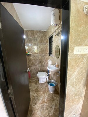 Bathroom in 1 BHK Apartment at Haware Dahlia, Kasarvadavali – for Sale