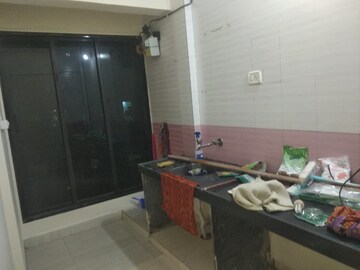 Kitchen in 1 BHK Apartment at Suryodaya Apartments, Seawoods Sector 48 – for Rent