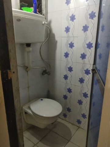 Bathroom in 1 BHK Apartment at Suryodaya Apartments, Seawoods Sector 48 – for Rent