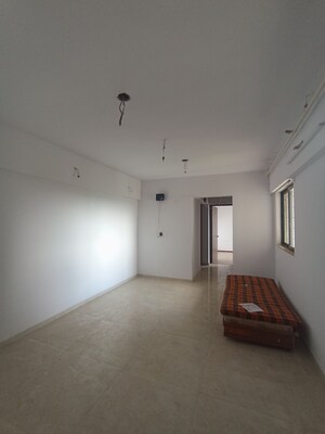 Living Room in 1 BHK Apartment at Lodha Palava City Lakeshore Greens, Dombivli East – for Sale