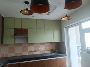 Kitchen in 3.5 BHK Apartment at 3C Lotus Boulevard, Sector 100 – for Sale