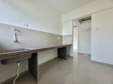 Kitchen in 3 BHK Apartment at Godrej Emerald, Ghodbunder Road – for Rent